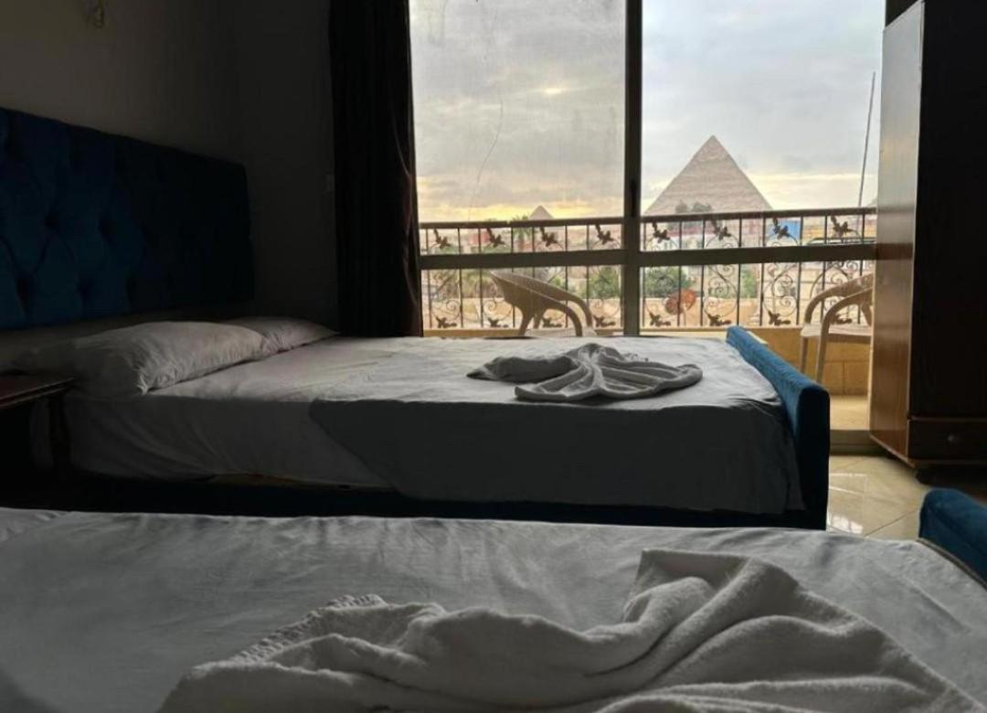 Pyramids Family Inn Kafret el-Gabal Exterior foto